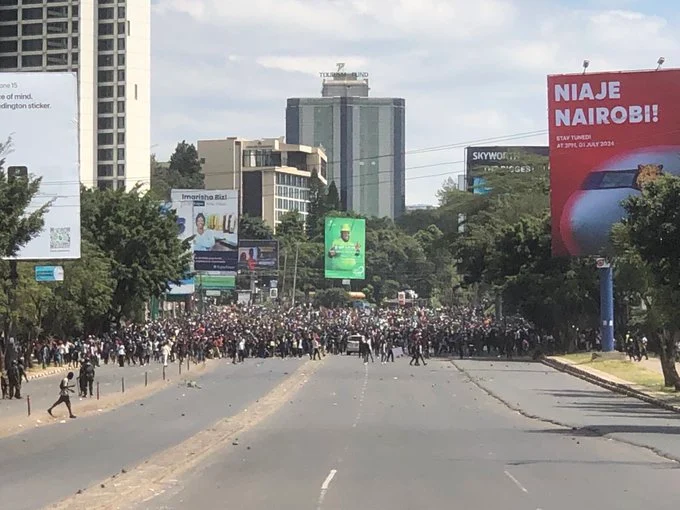 Protesters invade Kenyan parliament as lawmakers escape through underground tunnel